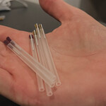 Scottsdale sports chiropractor Dr. Molly preparing dry needle therapy for soft tissue treatment