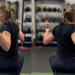 Seated woman performing golf rotation drill with a club across her shoulders to assess trunk mobility