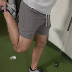 Golfer Stretching their quadruped muscle after golfing